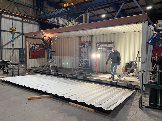Two RiseCon employees building a prefab ADU.